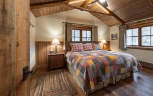 Bedroom in the Rimini Cabin at the Mountain Sky Guest Ranch