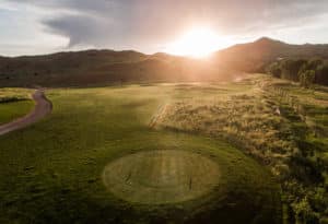 Sun setting on the Rising Sun Golf Course at Mountain Sky Guest Ranch